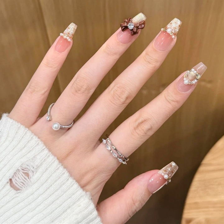 Artificial nail set with elegant appliqués Stornfield