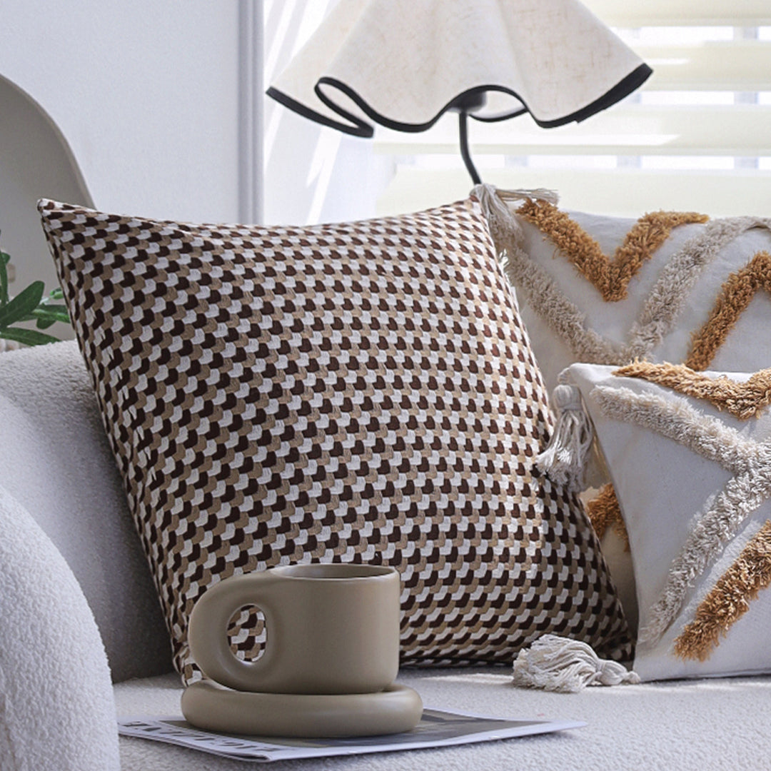 Square cushion cover made of cotton-linen with raised diamond tufting and corner tassels Stornfield