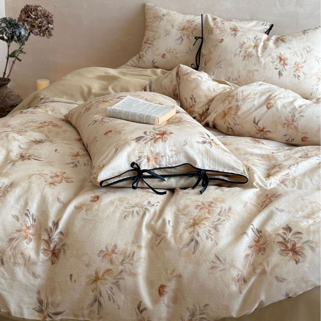 Bedding set made of cotton-linen with delicate watercolor floral print and decorative tying ribbons