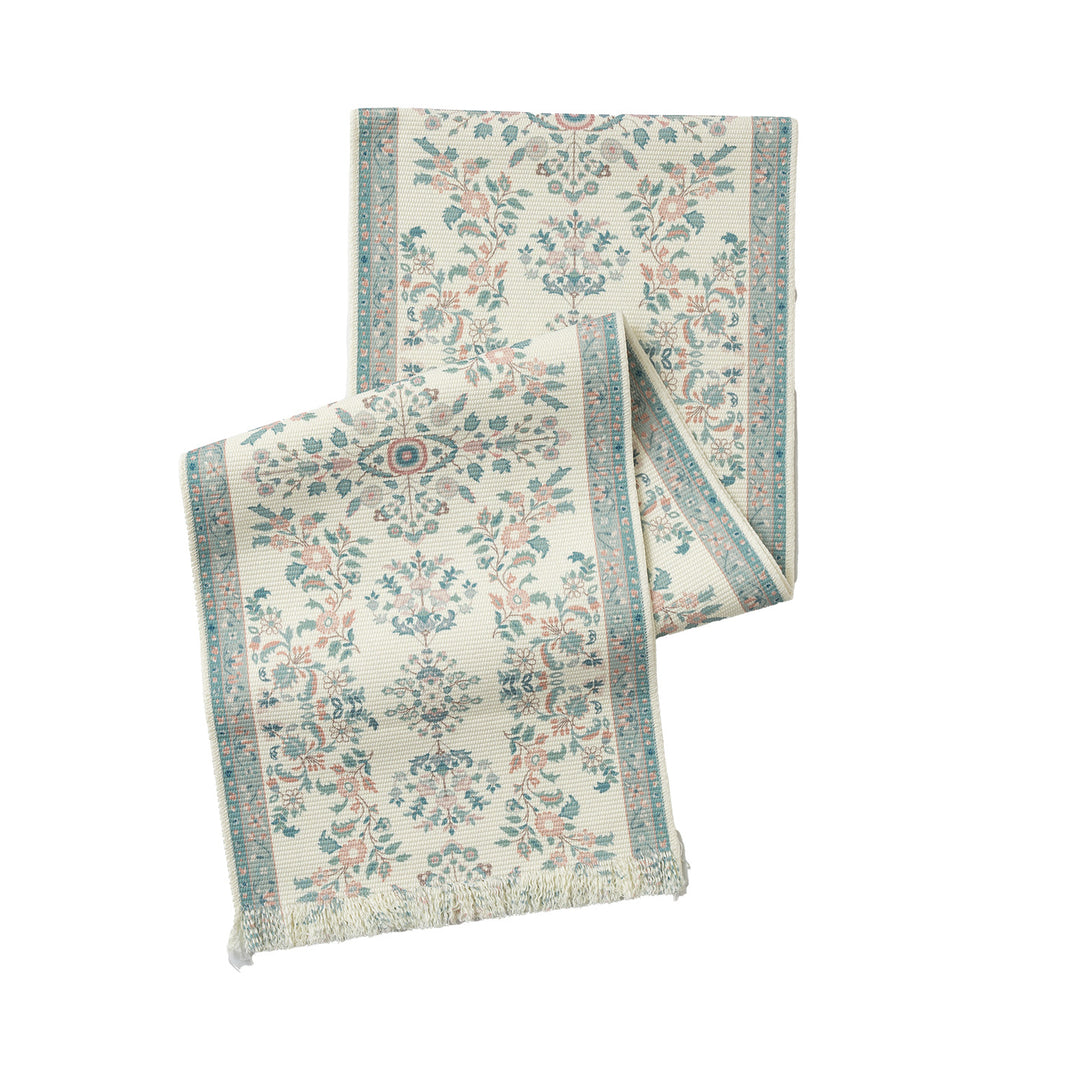 Woven runner with vintage-oriental floral pattern and fringes