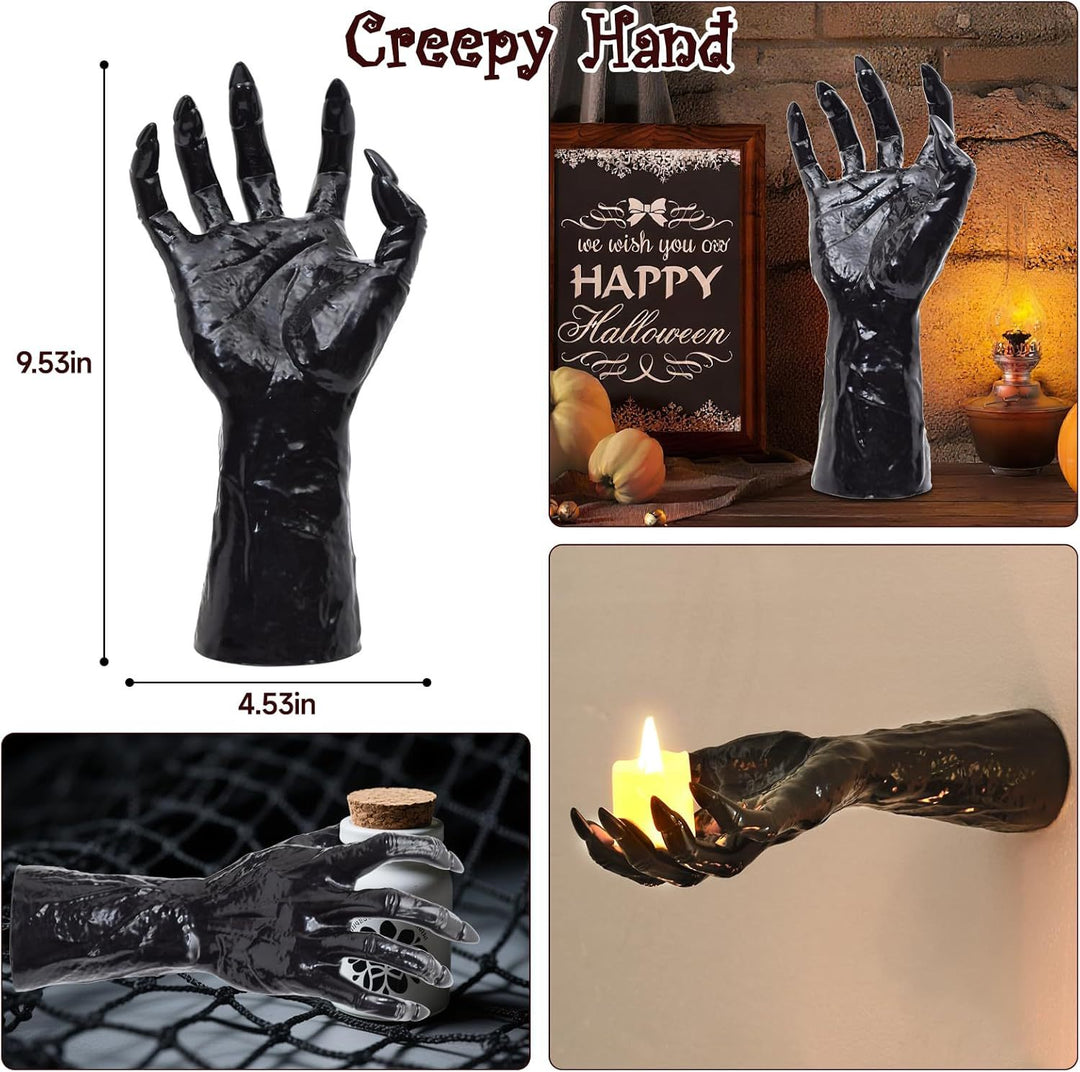 Wall candle holder in realistically shaped hand made of resin