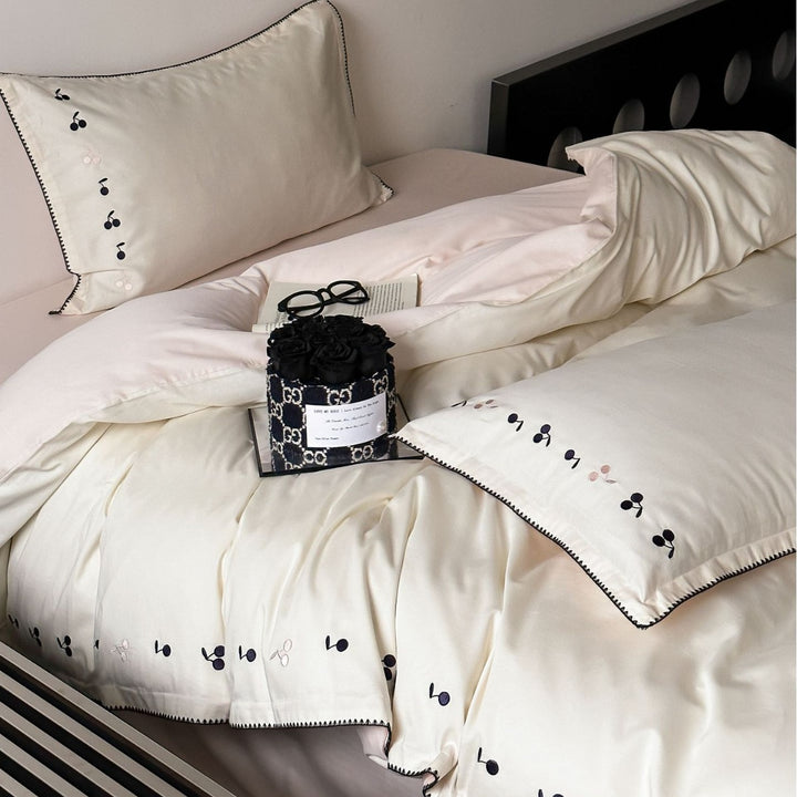Luxurious cotton satin bedding set with subtly embroidered cherries