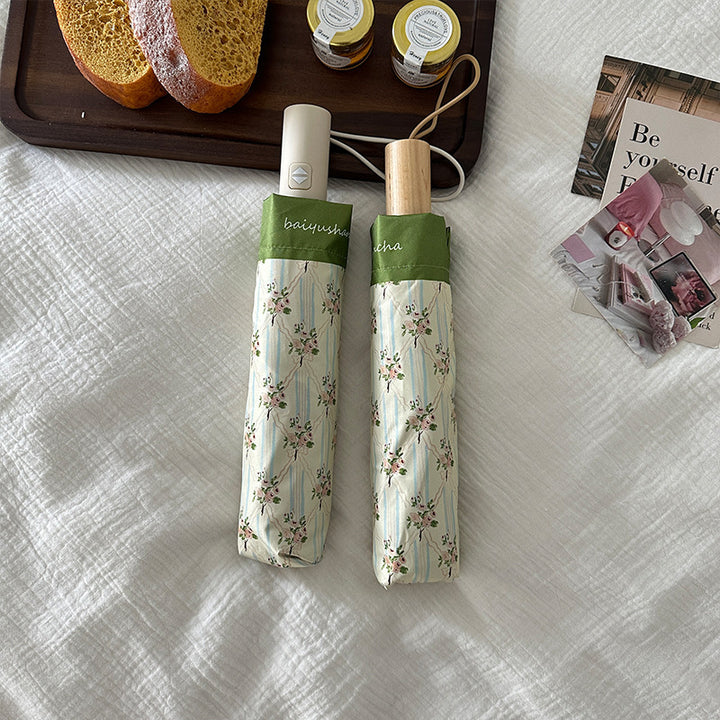 Ladies elegant folding umbrella with floral design Stornfield