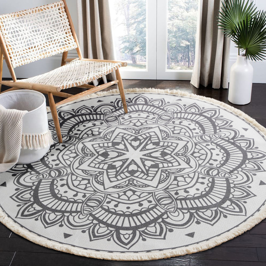 Round woven rug with mandala motif, flat cotton-jute mix and fringes Stornfield