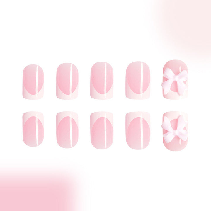 Acrylic nail set with playful bow design Stornfield