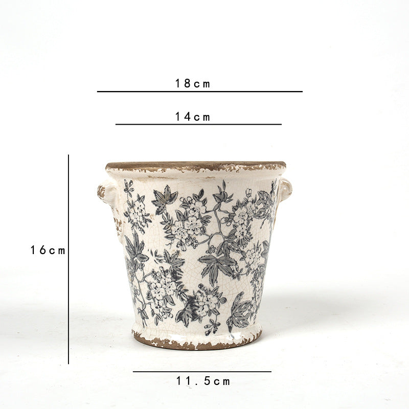 Decorative flower pot with floral embellishments Stornfield