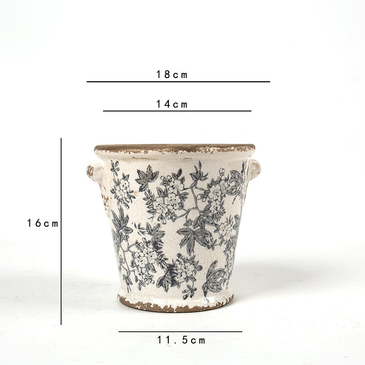 Decorative flower pot with floral embellishments Stornfield