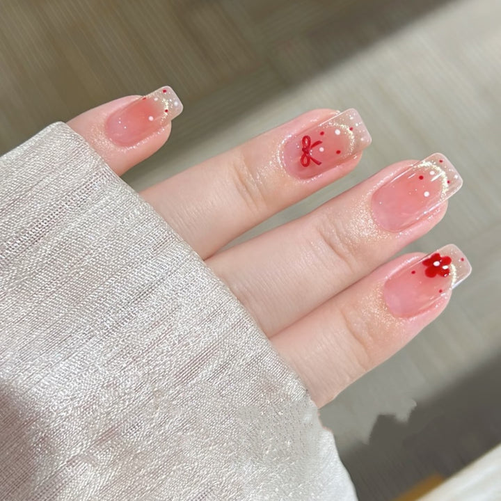 Decorative Press-On Nail Set with Floral and Bow Accents Stornfield