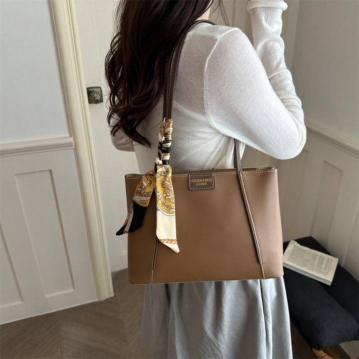 Elegant Leather Tote Bag with Decorative Scarf