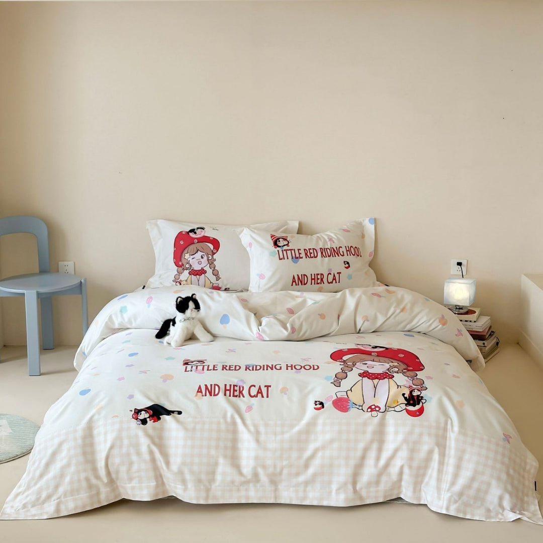 Bedding set for children made of cotton satin with contrasting piping and puppy print