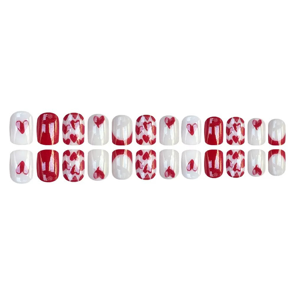 Nail art set with romantic heart designs and elegant shine Stornfield