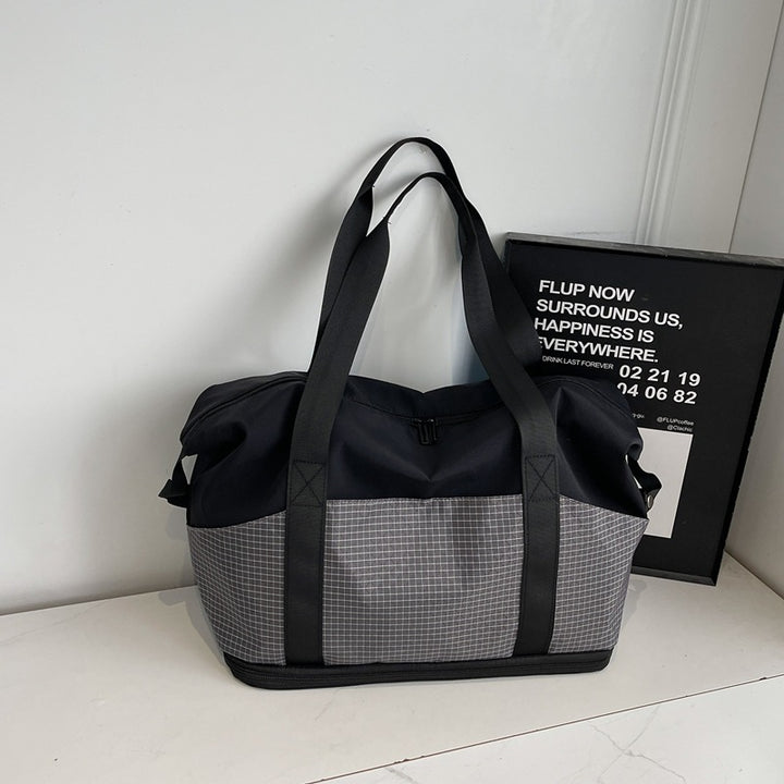 Multifunctional sports and travel bag with innovative compartment arrangement Stornfield