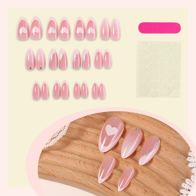 Acrylic nail set with romantic heart and glitter accents Stornfield