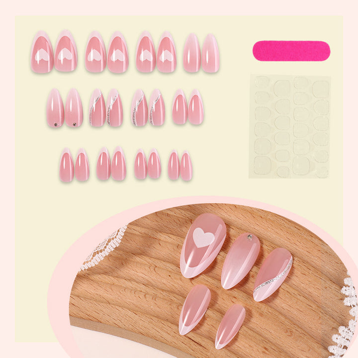 Acrylic nail set with romantic heart and glitter accents Stornfield