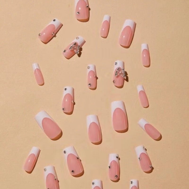 Elegant Glitter-Embellished French Tip Acrylic Nails Stornfield