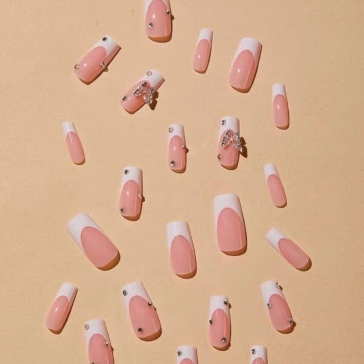 Elegant Glitter-Embellished French Tip Acrylic Nails Stornfield