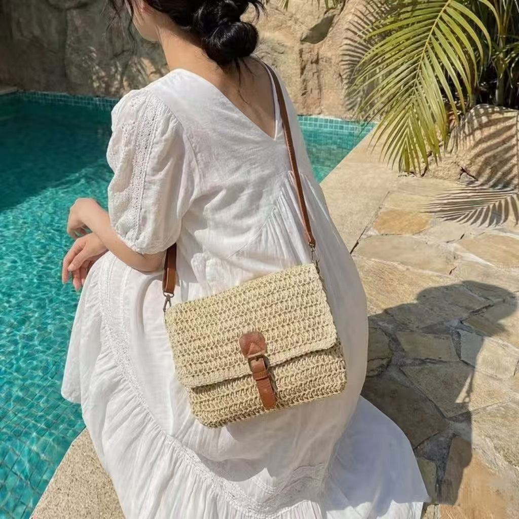 Handbag made of braided natural material with adjustable shoulder strap Stornfield