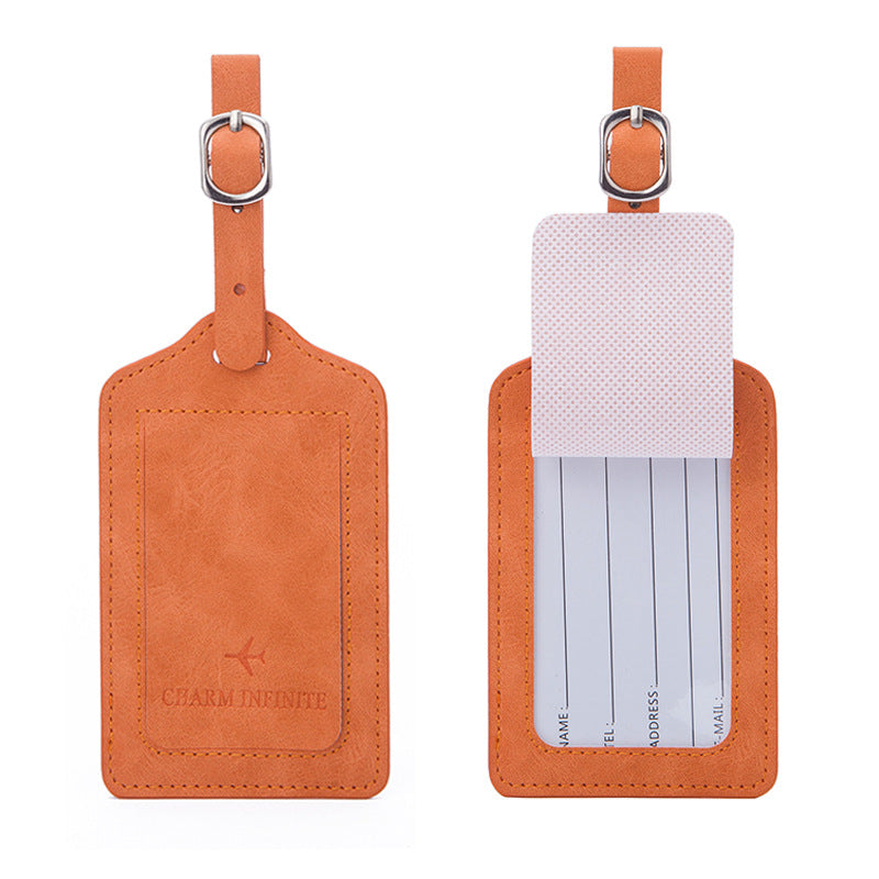 vintage leather luggage tag with transparent ID window and adjustable buckle strap Stornfield