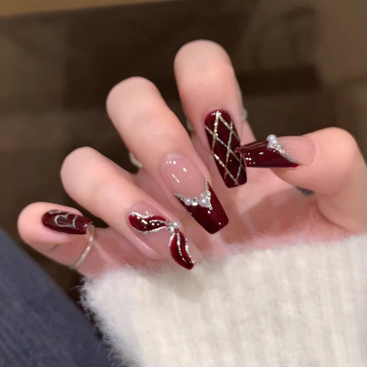 Artificial nails with floral 3D applications Stornfield