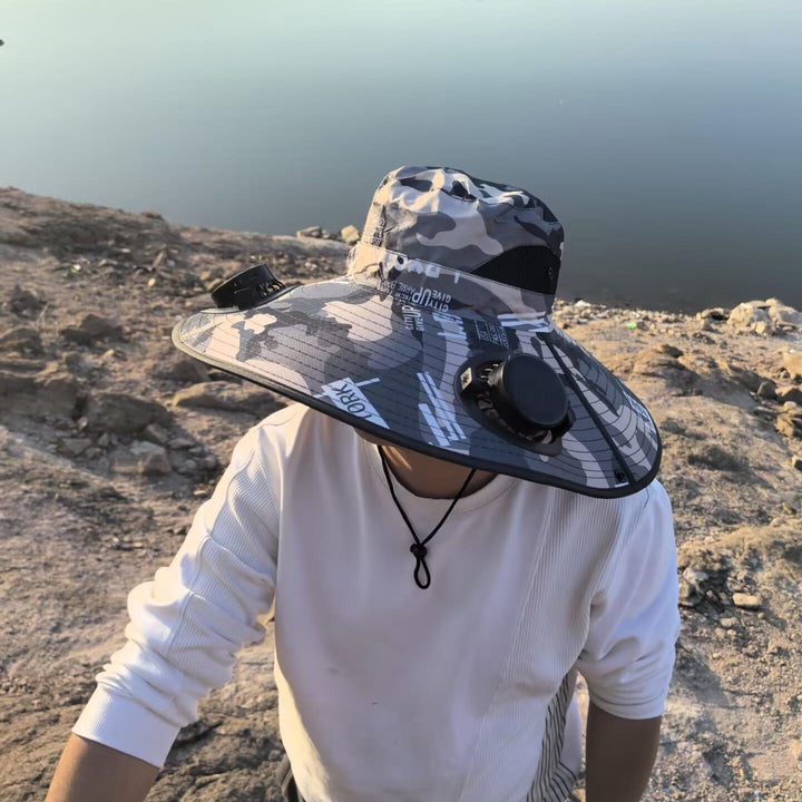 Ventilated sun hat with integrated solar fans and wide brim Stornfield