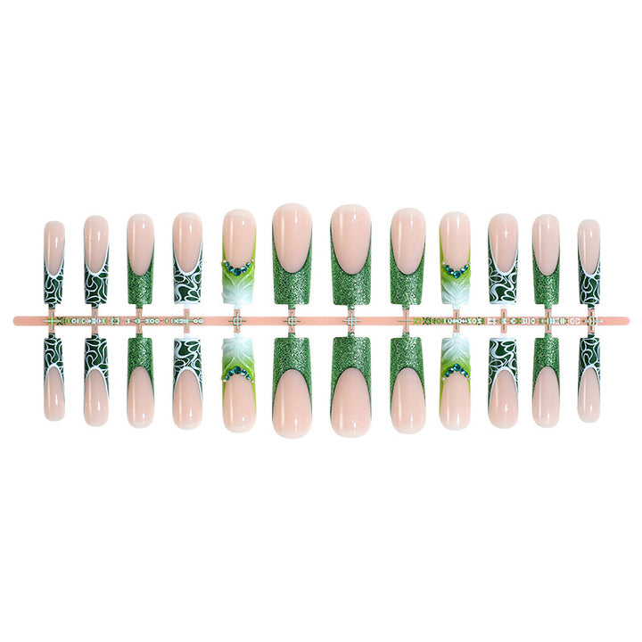 Artificial nail set with elegant glitter and specific designs Stornfield
