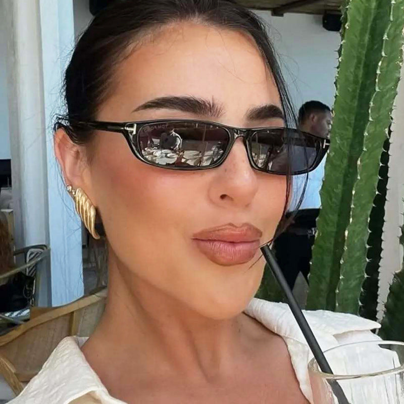Women's fashionable sunglasses with narrow frame and brown lenses Stornfield