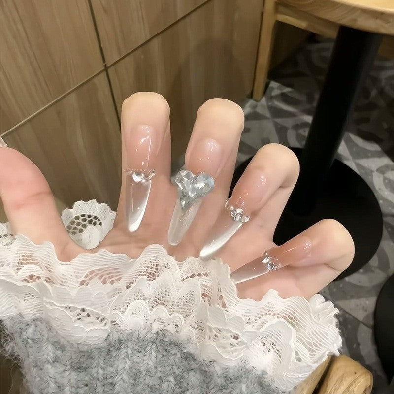 Artificial nail set with elegant tips and crystal accents Stornfield
