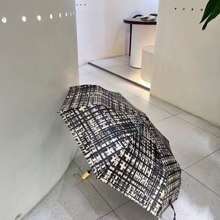 Women's Folding Umbrella in Modern Check Pattern Stornfield