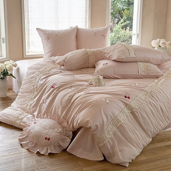 Luxurious satin bedding set with gathered ruffle, cherry embroidery and decorative pillow