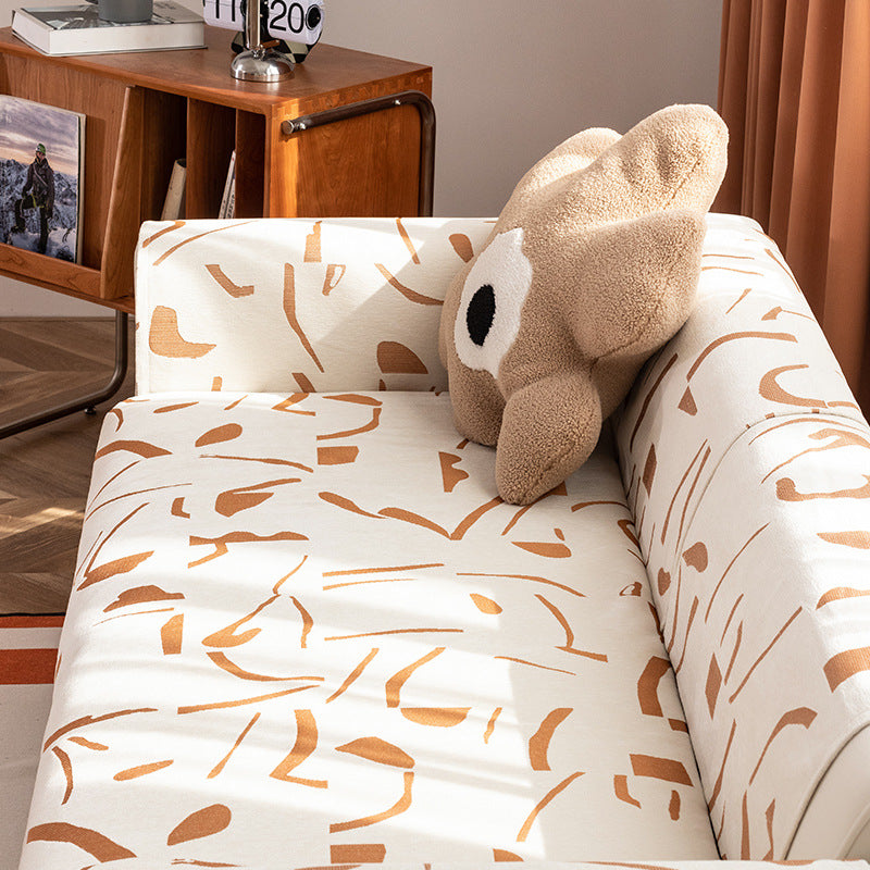 Stretch soft cover with abstract all-over print, elastic hem, and easy-care cotton blend