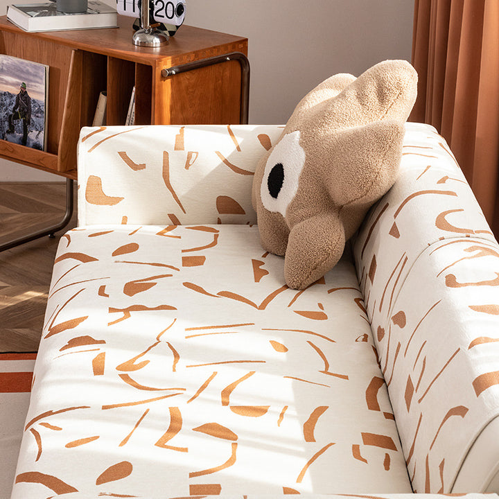 Stretch soft cover with abstract all-over print, elastic hem, and easy-care cotton blend