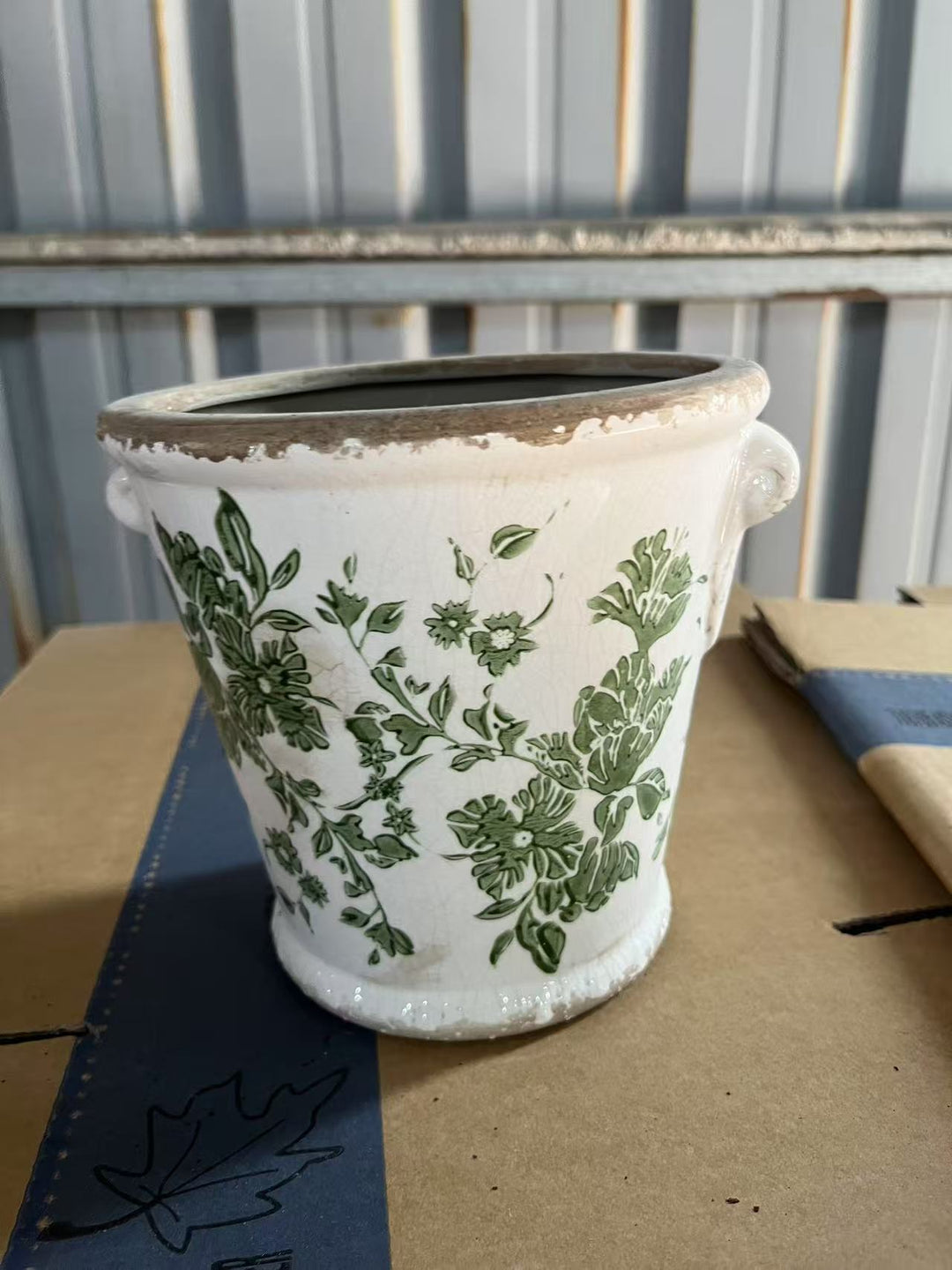 Decorative flower pot with floral embellishments Stornfield
