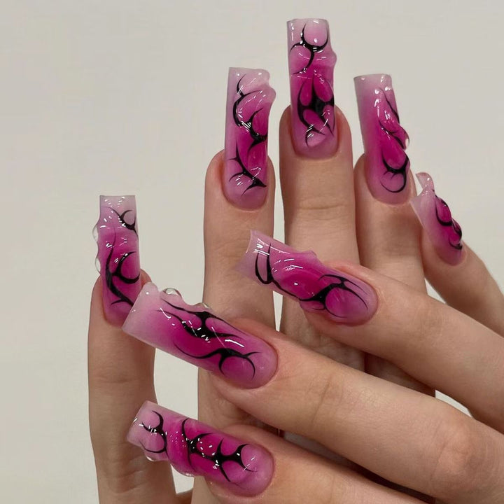 Artistic Nail Tips with Floral and Abstract Designs Stornfield 1788229281