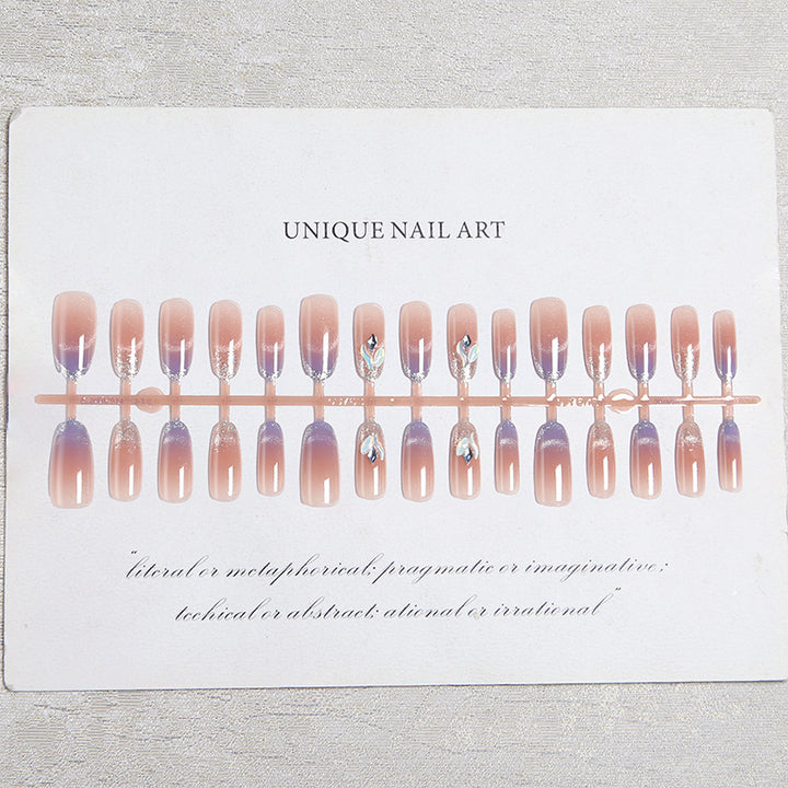 Acrylic nail set with elegant glitter effect and beautified embellishments Stornfield
