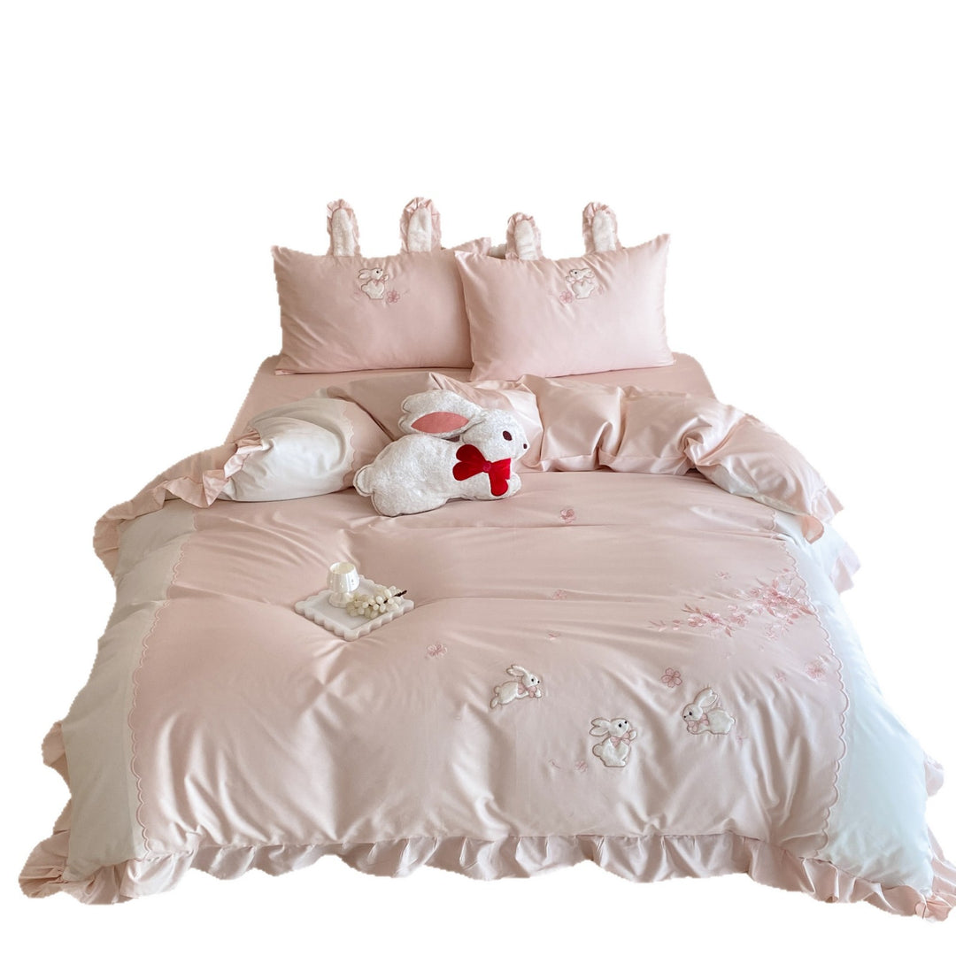 Bedding set with applied bunny embroidery, frill edge, and decorative pillow ears