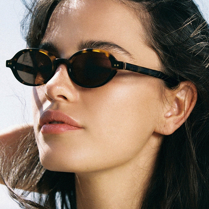 Ladies fashionable oval-shaped sunglasses with fancy frame Stornfield