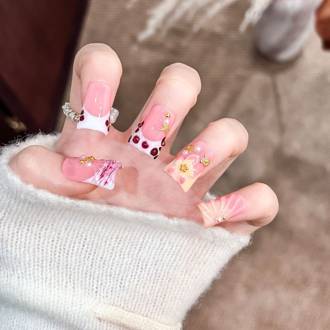 Artistic Acrylic Nail Design with Gem Accents