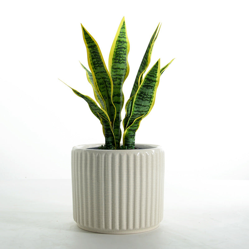 Elegant ceramic flower pot with ribbed structure Stornfield