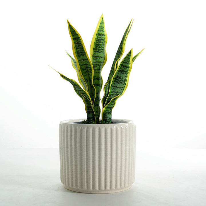 Elegant ceramic flower pot with ribbed structure Stornfield