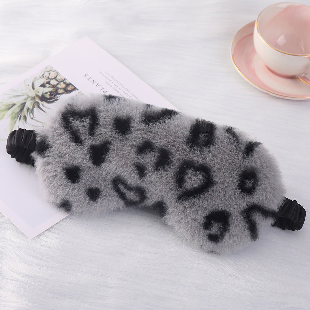Women's cuddly faux fur sleep mask with heart-embossed surface and gathered comfort band Stornfield