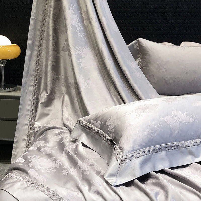 Premium cotton satin bedding set with fine jacquard floral texture and piped border