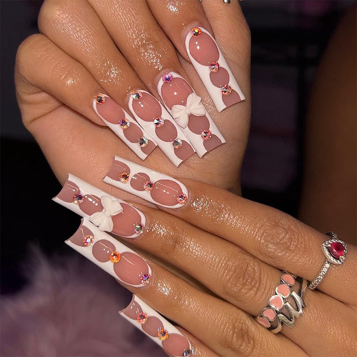 Elegant and artistic nail art with rhinestone details Stornfield