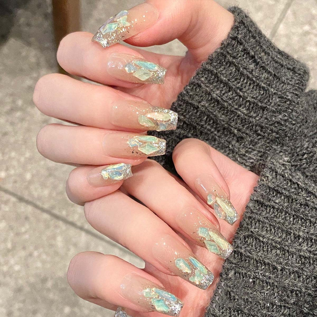 Glamorous nail tips with glitter accents Stornfield