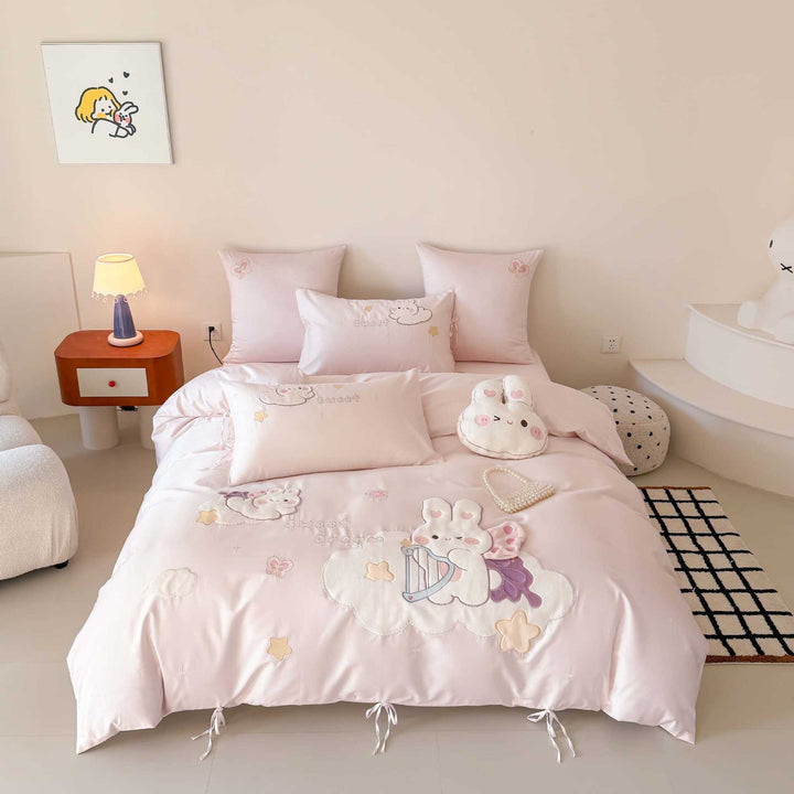 Children's bedding set with embroidered bunny appliqués and satin trim