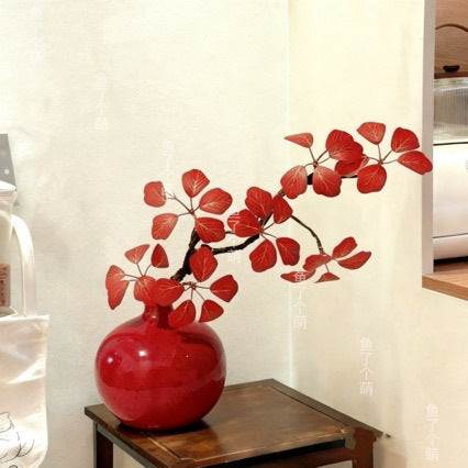 Artistic Ceramic Vase with Lifelike Floral Arrangement