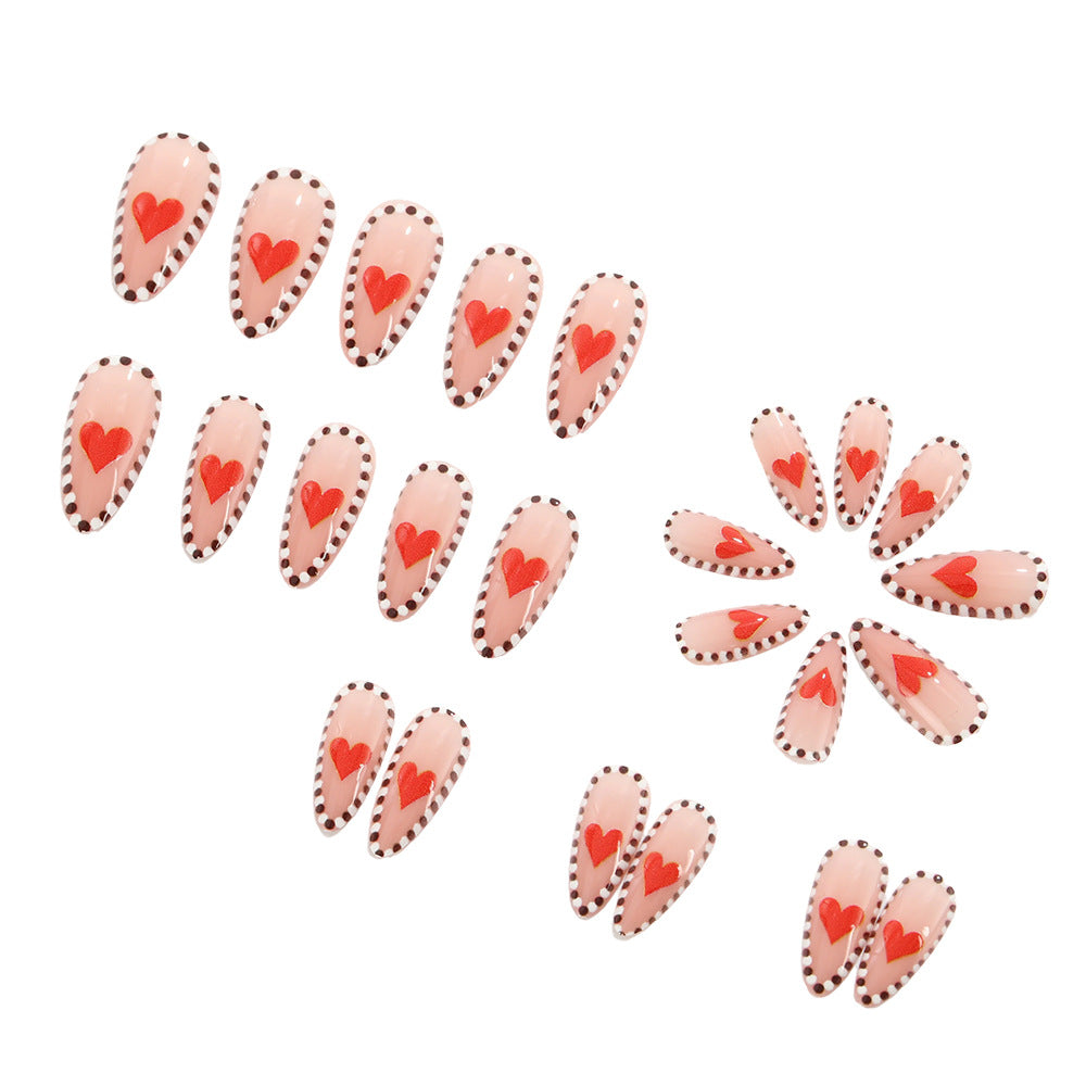 Artificial nails with heart-shaped accents Stornfield