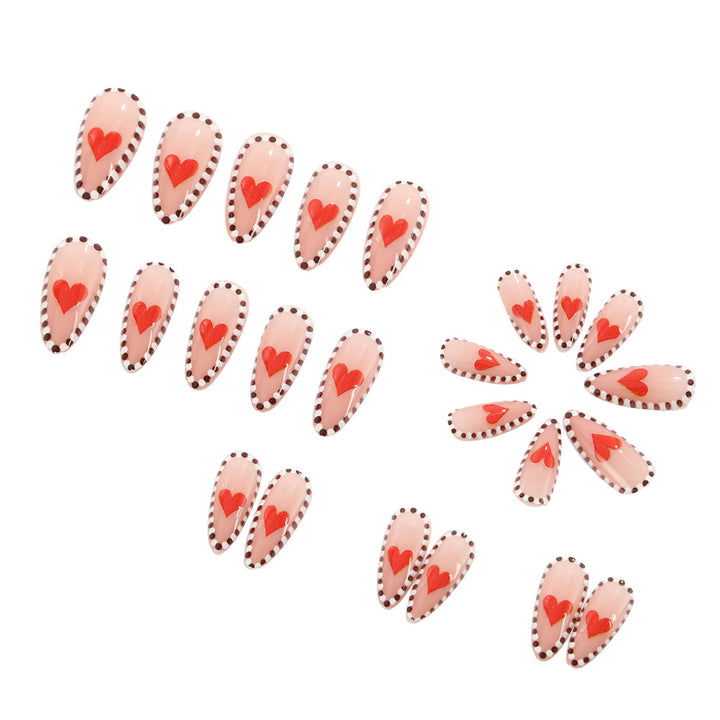 Artificial nails with heart-shaped accents Stornfield