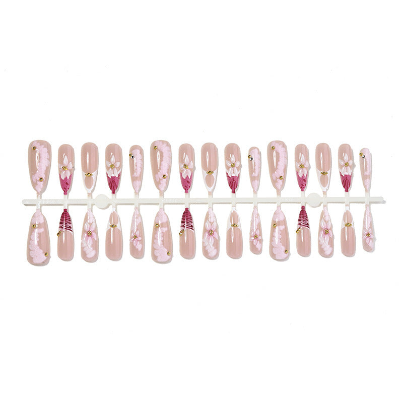 Artificial nail set with floral and elegant design elements Stornfield