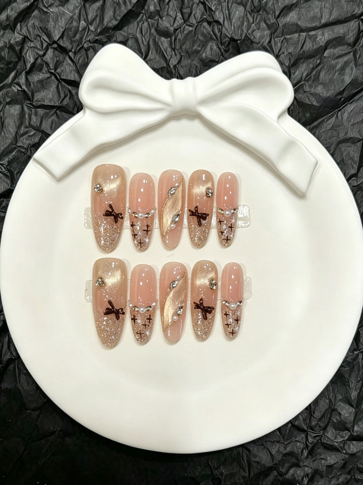 Decorative Press-On Nail Art Set with Glitter and Floral Accents  1791774296