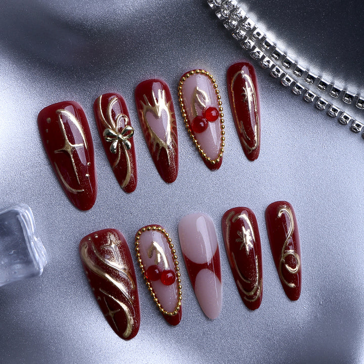 Artificial nails with elegant gold design Stornfield